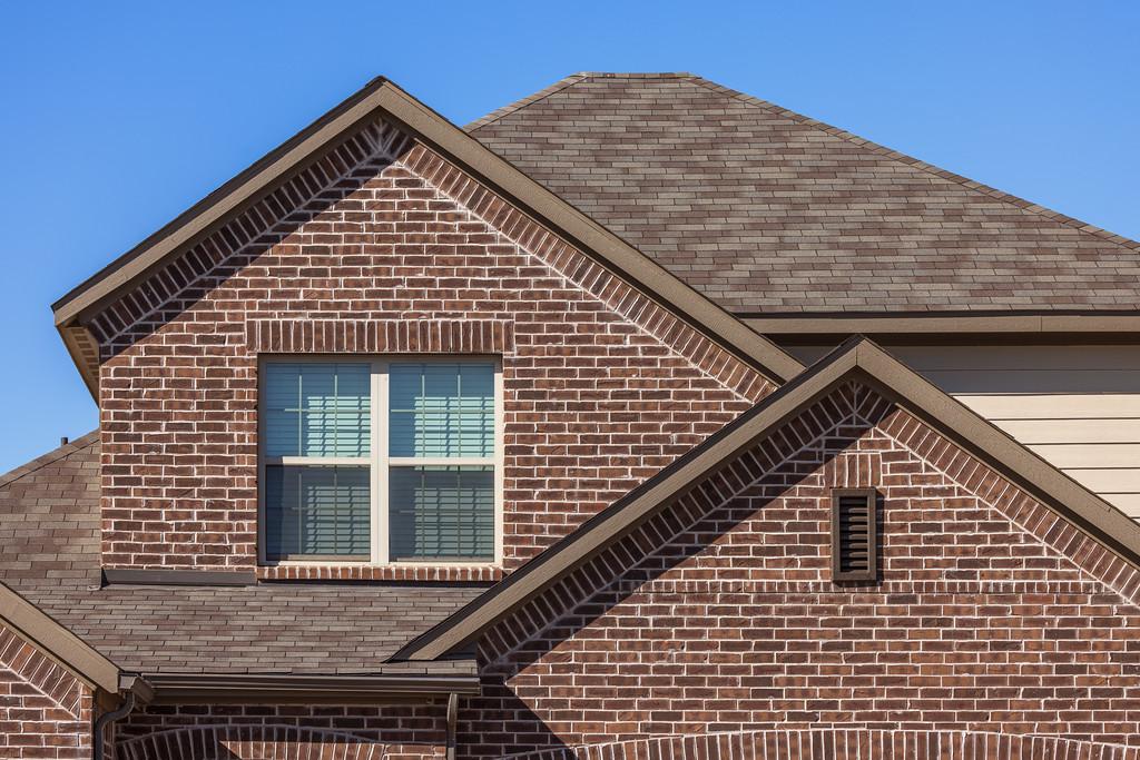 brown brick residential house